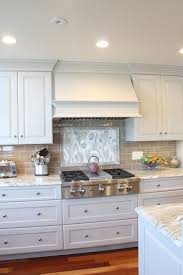 Wood Hood Tile Back Splash Granite Counter Tops White Painted Cabinets Kitchen Tiles Backsplash Kitchen Countertops Kitchen Tile