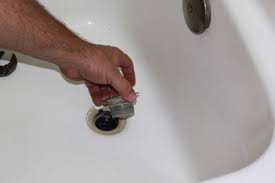 The tub drops into the surround and is supported by a mortar bed. How To Install A Stopper Drain Fitting In A Bathtub
