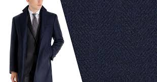 It's pretty slim, but roomy enough to wear over a suit jacket. The Types Of Men S Coats To Wear Over A Suit Black Lapel