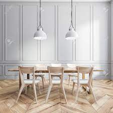 Like the other showcases, dining areas can use wood for the entire wall or merely as an accent wall. Interior Of Dining Room With Gray Panel Walls Wooden Floor Wooden Table With White And Wooden Chairs Near It And Two Ceiling Lamps 3d Rendering Stock Photo Picture And Royalty Free Image