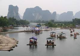 Yùlóng hé) is a small tributary of the larger li river in southeastern guangxi zhuang autonomous region that runs through the major city of guilin to. Yangshuo Yulong River Yulong River Yangshuo Yulong River Travel Photos Bamboo Rafting Yulong River Yangshuo