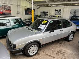 Image result for Gray 1984 Alfa-Romeo