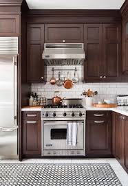 11 Easy Ways To Modernize Brown Cabinets In 2020 Bistro Kitchen Brown Kitchen Cabinets Kitchen Inspirations