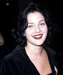 Drew Barrymore's Hair Evolution from 1982 to 2023