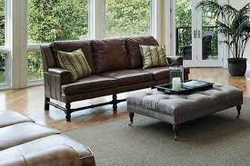 Your coffee table should be at least half the length of your sofa (but no more than roughly ⅔ the length) and should sit at about the same height as the seat, give. 17 Dark Brown Leather Sofa Decorating Ideas Home Decor Bliss