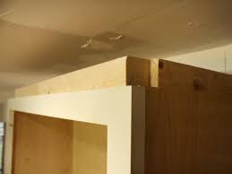 We suggest installing this type of kitchen cabinet molding for functionality as they deflect the light glare, while also adding a decorative touch. How To Install Cabinet Crown Molding How Tos Diy