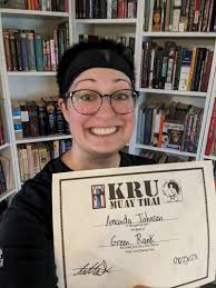 it may say Green, but I'm far from new at this. Marking one year in my Muay  Thai journey, I achieved my green rank this evening. Eyes