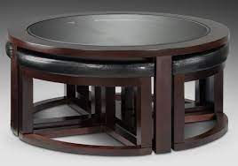 The arnei coffee table is perfect for small spaces. Emma Coffee Table W Four Ottomans Leather Ottoman Coffee Table Ottoman Coffee Table Storage Ottoman Coffee Table