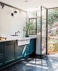 This Unexpected Kitchen Cabinet Color Is Suddenly Everywhere Teal Kitchen Cabinets Teal Kitchen Kitchen Interior