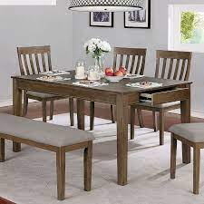 The great thing about a taller table is that the added height lets the table double as a prep space, which is a major advantage in a small kitchen. Astilbe Dining Table By Furniture Of America Furniturepick