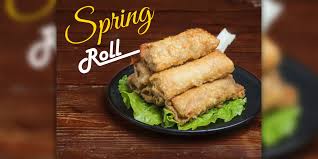 A popular deep fried appetizer / snack food or a kind of dim sum from the south east asian cuisine. Vegetable Spring Rolls Recipe At Home In Hindi