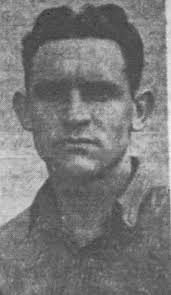 The man pointing to the plane is Col. Wilbur Grumbles, EHS class of '36.  Col. Grumbles was shot down in Italy during WWII and was a POW. Col.  Grumbles was the first