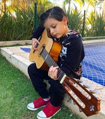 Facebook gives people the power to share and makes. Mini Cris Filho De Cristiano Araujo Toca Violao E Emociona Fas