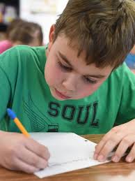 Cotter students learn cursive handwriting