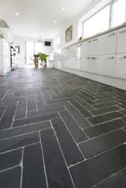 Stunning quality without compromising on style. Slate Floor Tiles For A Contemporary Modern Kitchen With White Units Slate Tile Floor Kitchen Slate Kitchen Slate Floor Kitchen