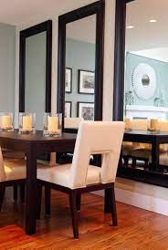Decorating A Dining Room Wall With Triple Vertical Large Mirrors Decorating A Dining Room Wall Decorating Dining Room Dec Home Home Decor Dining Room Decor