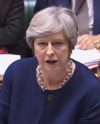 SNP MP brandishes red card at Theresa May after Tory MP Douglas Ross missed  day in parliament to run line at Champions League match