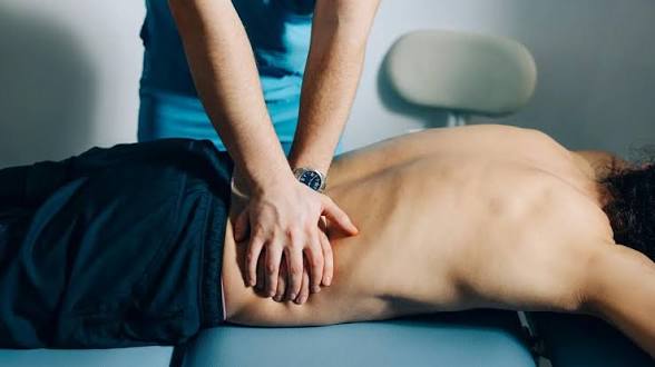 Relaxing massage treatment with candles