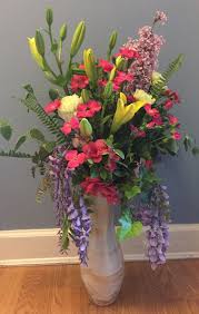 It produces masses of hanging sprays, up to 6 in. Flower Arrangement With Wisteria April Spring Flower Arrangements Flower Arrangements Floral Arrangements