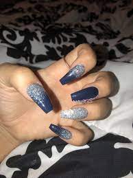 It's a popular nail trend in 2019. Navy And Sparkle Rhinestoned Acrylic Nails Gold Acrylic Nails Navy Acrylic Nails Navy And Silver Nails