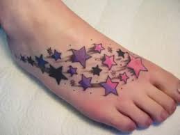 A small and big star tattoo on foot. 15 Best Star Tattoo Designs For Men And Women Styles At Life