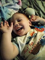 Is teeth grinding normal in a baby with spastic quadriplegic cerebral palsy?