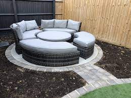 Attach string to the stake and measure out the radius (half the diameter) of the circular patio. Seating Area In Courtyard Garden Tds