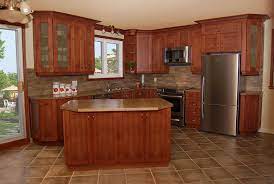 An open concept kitchen overlooks the pool area. Open Concept L Shaped Kitchen With Island Floor Plans