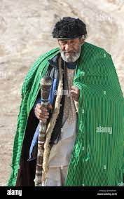 Old muslim man walking stick High Resolution Stock Photography and Images - Alamy