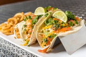 Grill or bake until done. Grilled Fish Tacos Fresh And Local Served With Curly Q Fries And Our Tropical Mango Salsa Picture Of Baumhower S Victory Grille Mobile Tripadvisor