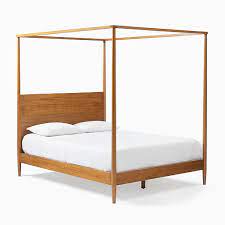 These canopy wood bed come with amazing features and enhance safety and the quality of sleep. Mid Century Canopy Bed