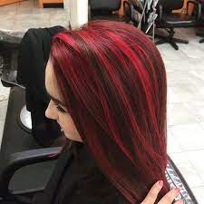 The deep tones of your red hair pairs perfectly with a slick, shiny black color. 70 Sensational Red Highlights Styles Flames In Your Hair Hair Color Highlights Red Hair With Highlights Bright Red Hair