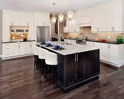 Transitional style kitchen with gorgeous wooden floor, ample natural finding space for wood beyond just the kitchen floor to give the rustic kitchen a comfy vibe [from: Can I Have Light Kitchen Cabinets With Dark Floors