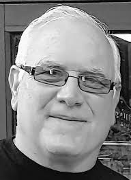 Tim F. “Tank” Evans