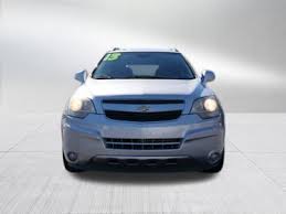 Image result for Silver Topaz 2013 Captiva