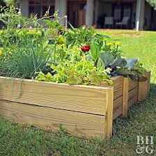 If you are lining your bed for the purpose of weed and grass barriers, one option is to lay cardboard in the bottom of your bed. What Do I Put At The Bottom Of A Raised Bed Before I Add Soil Better Homes Gardens