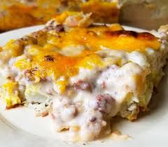 Biscuits And Gravy Casserole With Eggs Sausage Gravy Breakfast Casserole The Frozen Biscuit Recipe Breakfast Casserole Sausage Sausage Gravy Hashbrown Breakfast Casserole