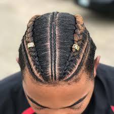 Jet black hair knotted in cornrows braids and secured on one side to create a graceful looking hairstyle. 31 Of The Coolest Braided Hairstyles For Black Men Cool Men S Hair