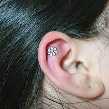 18 Tiny Tattoos That Are Prettier Than Any Piercing Inner Ear Tattoo Ear Tattoo Cute Tiny Tattoos