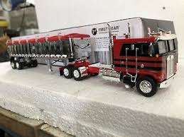 This design was necessary due to government regulations that limited. Dcp 34198 Comet Kenworth K100 Coe Tautliner Tri Axle Trailer 1 64 Diecast Toy Vehicles Contemporary Manufacture