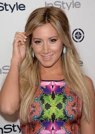The actress pulls up a part of her hair to add layers to the subtle wavy hair. Ashley Tisdale Hairstyles Styles Weekly