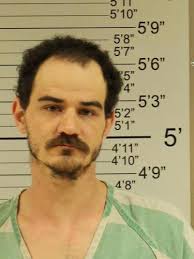 Police: Man tried to run down woman with car