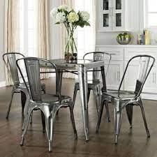Clean beveling on the tempered glass top with unique frame along with the supportive back chairs will bring a. Look Chic Industrial Dining Table In Kitchen Dining Room Sets Home Decor
