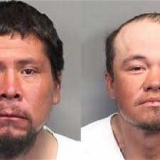 Two suspects charged with open murder in death of Reno man