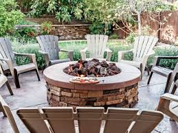How i made a backyard firepit with wall blocks and cap for a 36 fire ring with a swinging grate for over the fire grilling. Outdoor Fire Pit Worth The Investment Millionacres