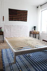 We hacked ikea kallax units into a full size bed frame with storage to save space and money. Diy Ikea Hack Upholstered Bed Lauren Koster Creative