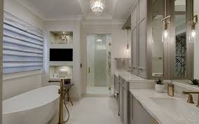 An elegant showroom featuring a complete selection of lighting fixtures from quality manufacturers. Bathroom Design Drury Design Kitchen And Bath Studio