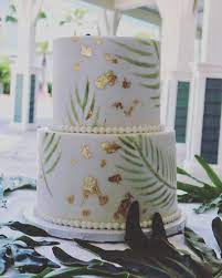 Stenciled Palm Leaves And 24kt Gold Leaf Baby Shower Cake Safari Baby Shower Cake Baby Shower Cakes For Boys Dinosaur Baby Shower