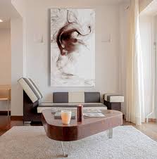 I quadri canvas grandi dimensioni conferiscono alle stanze un aspetto completamente nuovo e spesso basta solo questo per cambiare stile in una casa. Come Disporre I Quadri Segreti Per Una Giusta Composizione