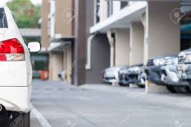 Cars for sale stock lot row. Back Of White Car Parked Neatly Inside An Outdoor Parking Lot With Blur Car Background Stock Photo Picture And Royalty Free Image Image 94018185